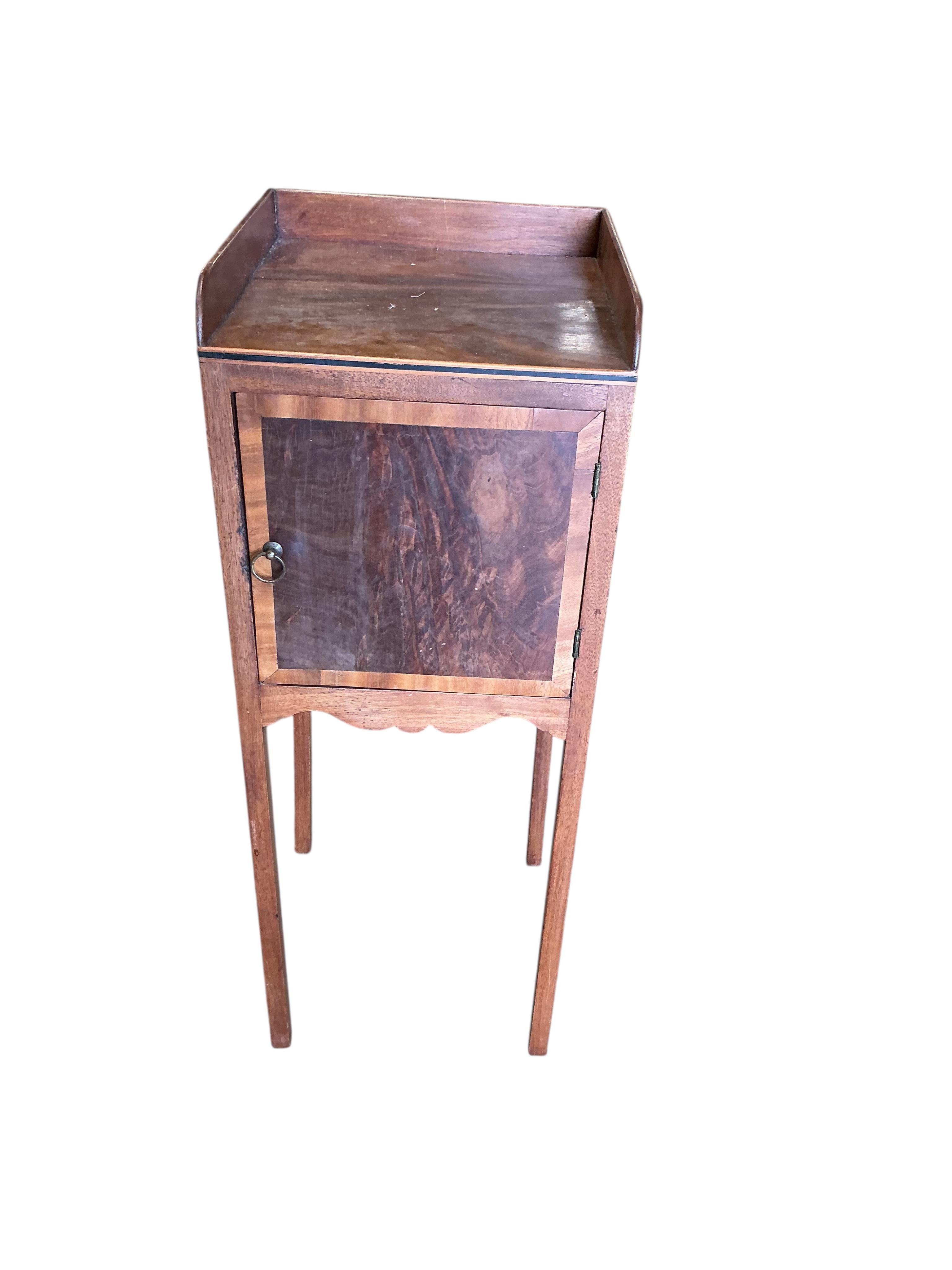 A George III mahogany bow front corner washstand, pot cupboard and an Edwardian plant stand